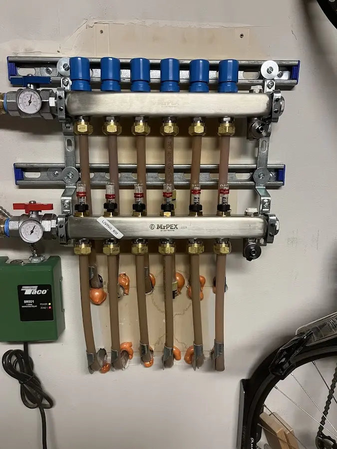 Plumber performing Gas Leak Detection at a residential property in Harrietstown